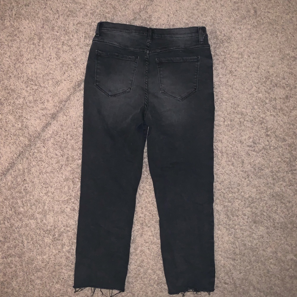size 12/13 black slightly ripped washed jeans